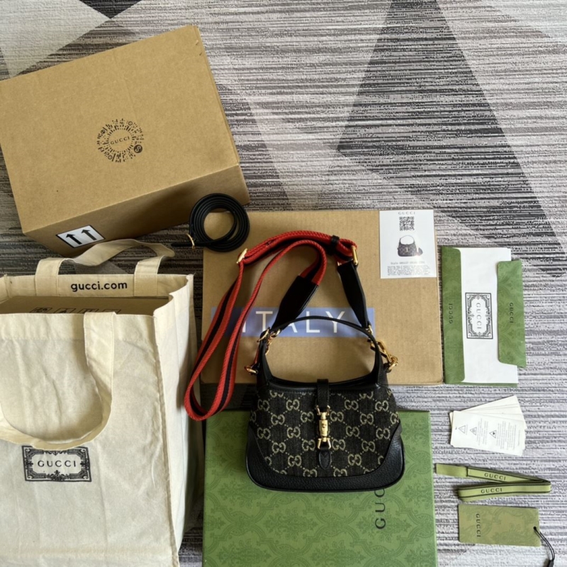 G*u*i top handle bags